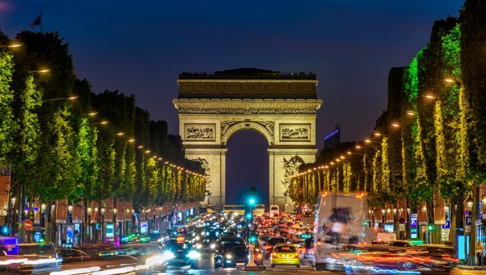 champs élysées in paris at night