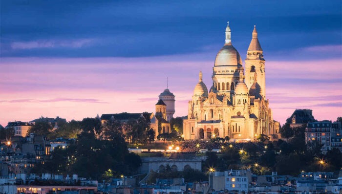 sacre coeur basilica illuminated at night